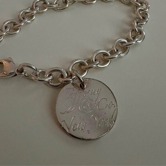 Tiffany & Co. Silver Script Notes Round tag 7.25" Bracelet - Picture 2 of 5
